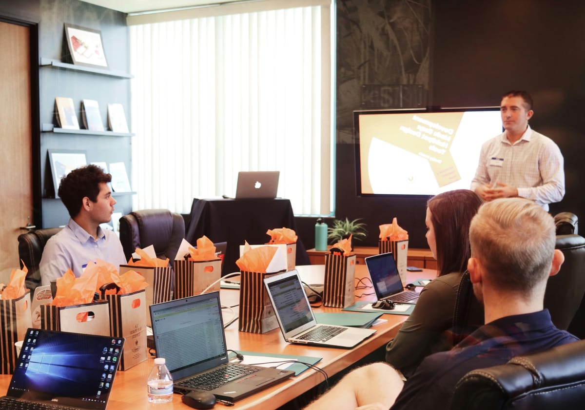 a manager presenting to a group